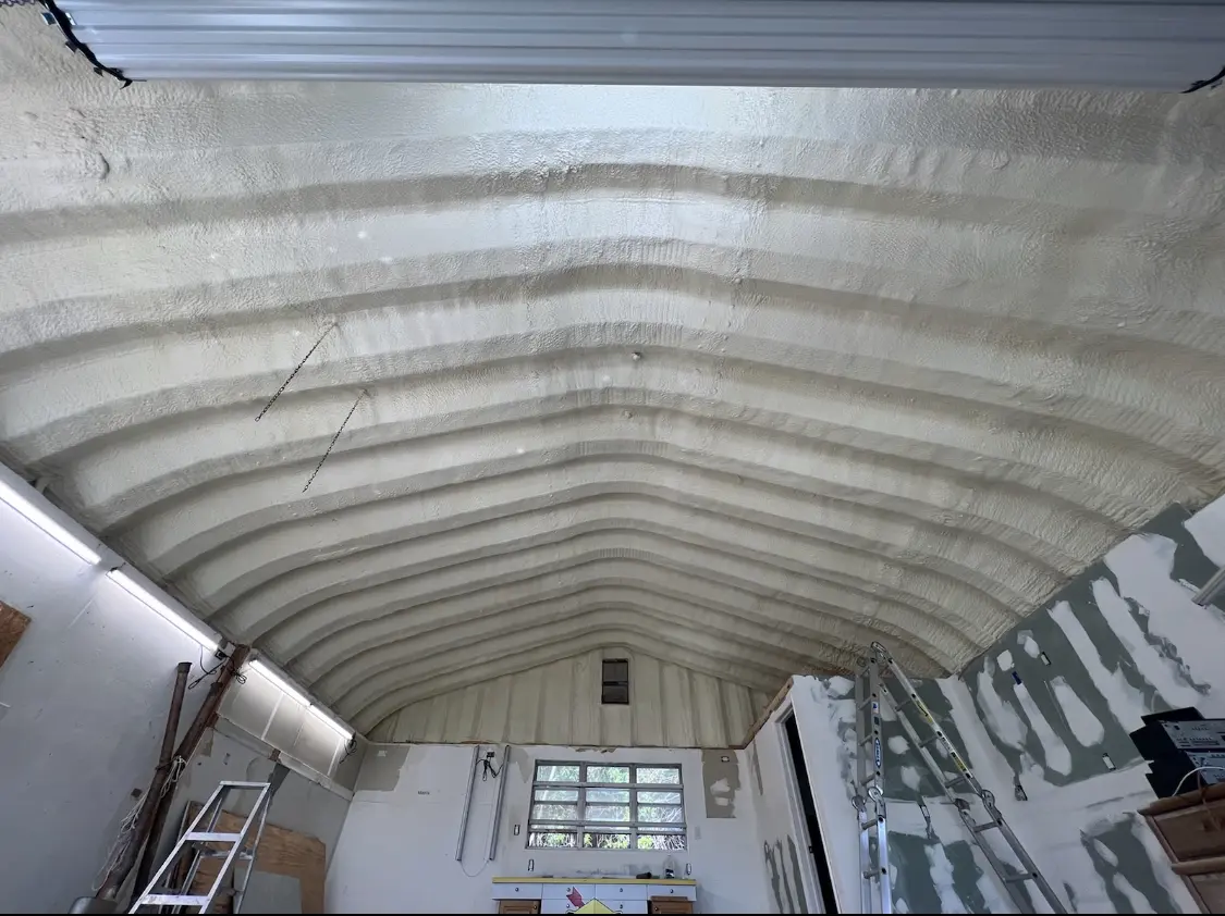 Spray polyurethane foam applied to the underside of a metal roof deck in Middletown